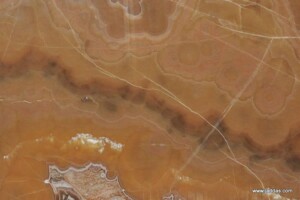 Orange nuvolato onyx slab and tiles for countertops