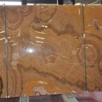 Orange nuvolato onyx slab and tiles for countertops